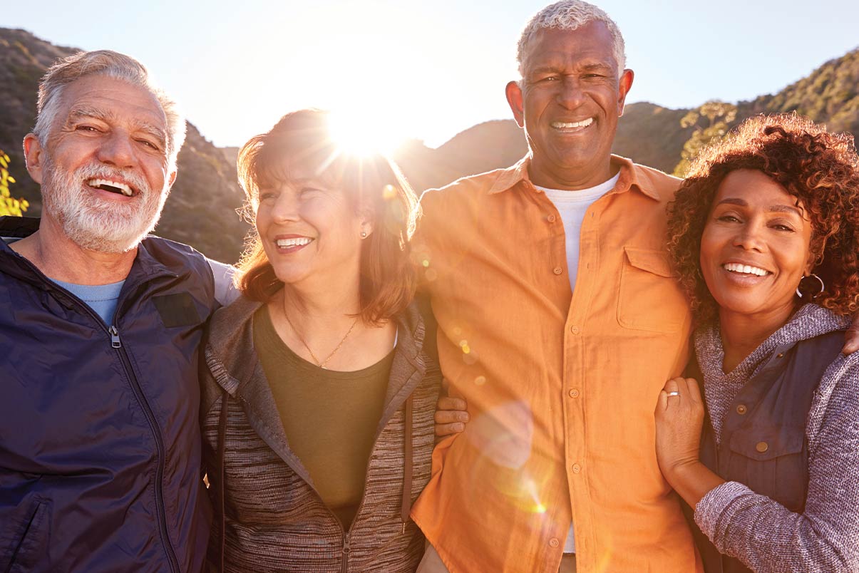 portrait of senior friends with sun shining behind them reasonable rate of return for retirement st charles il